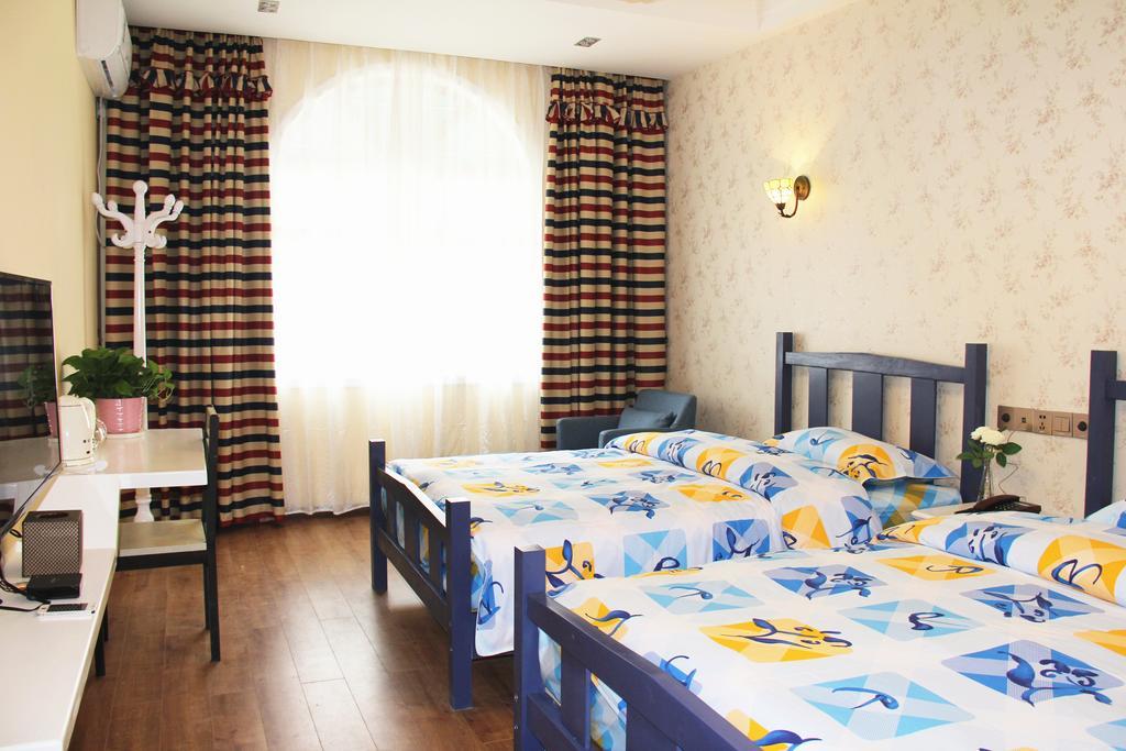 Raimi Hotel Chaqiyu Phòng bức ảnh